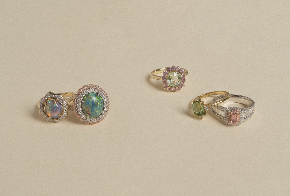 Collection of opal and tourmaline set pieces set in 18k yellow, white, and rose gold.