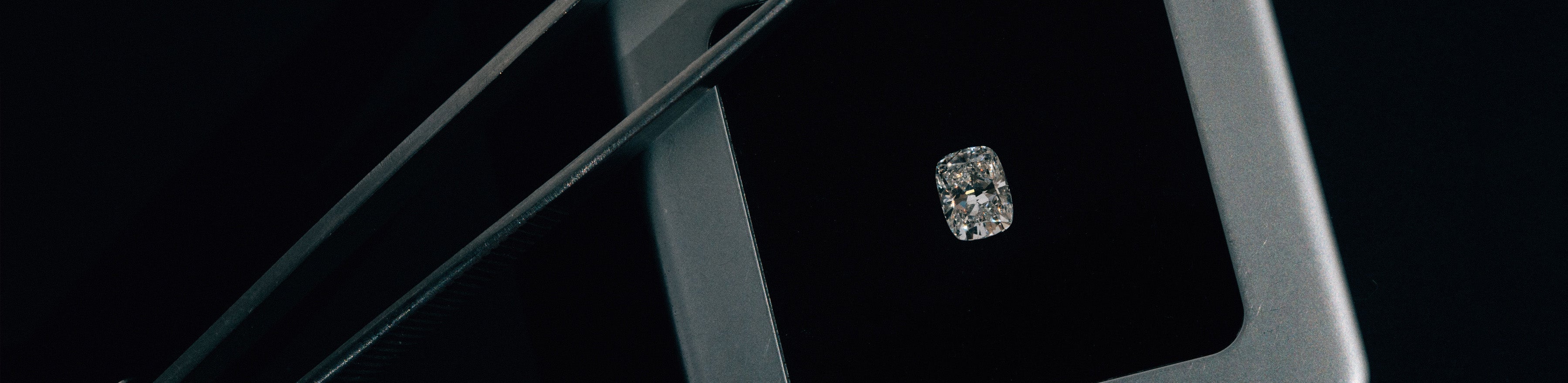 Cushion cut natural white diamond.