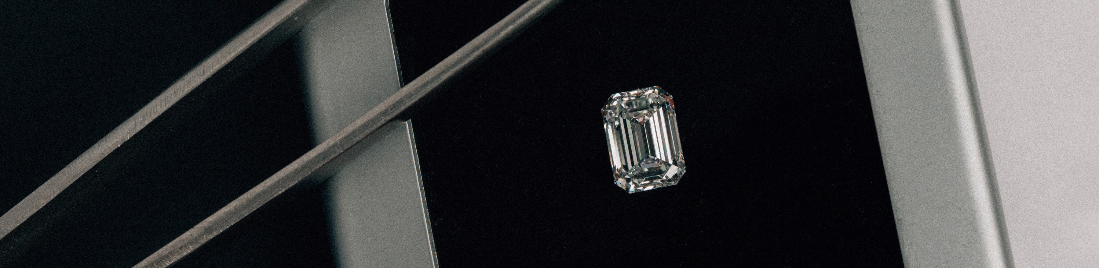 Emerald cut natural white diamond.