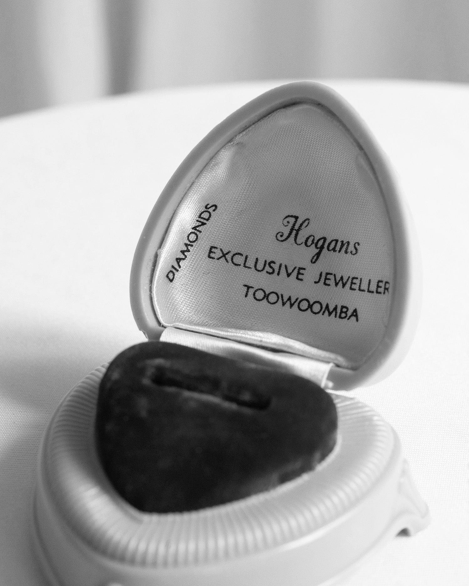 Black and white photo of original Hogans Family Jewellers ring box.