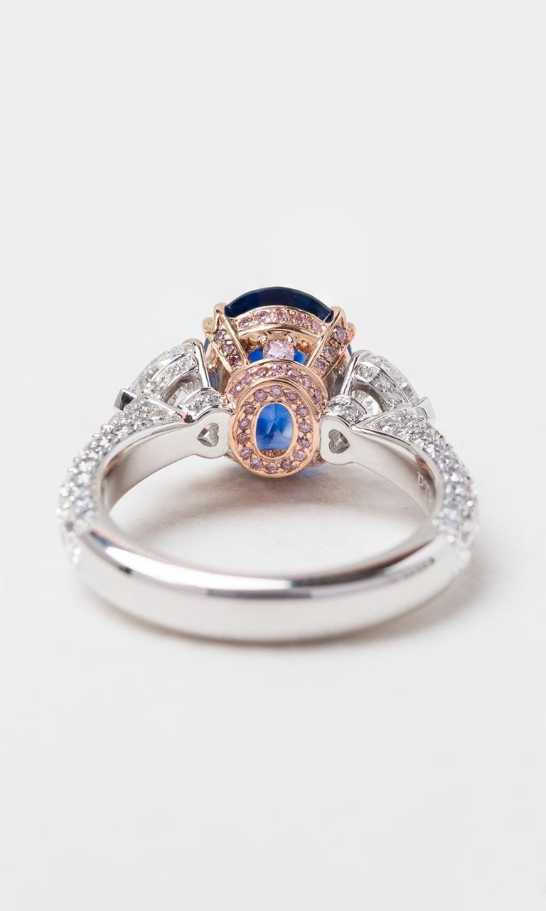 Hogans Family Jewellers 18K RWG Oval Cut Sapphire & Australian Pink Diamond Trilogy Ring