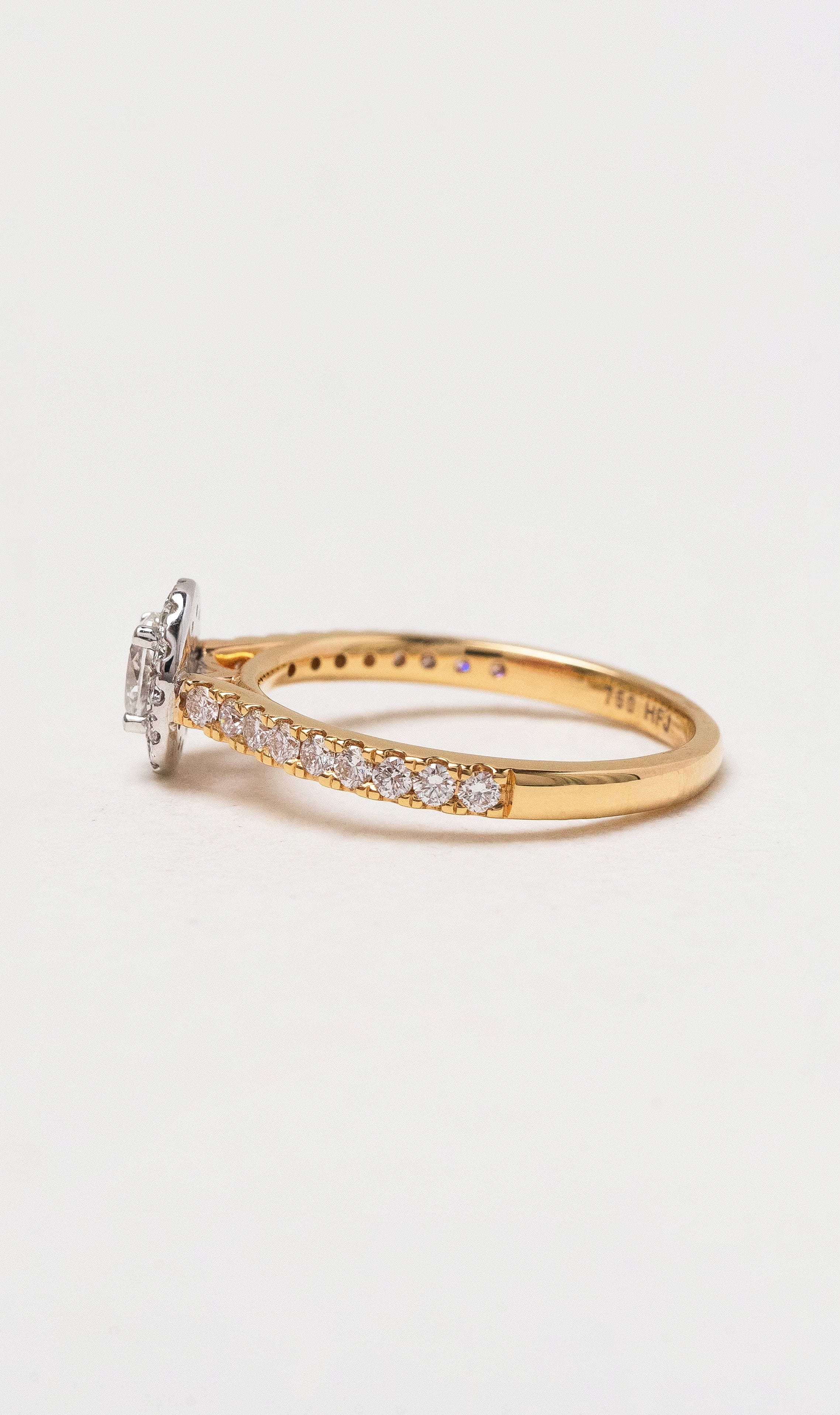 Hogans Family Jewellers 18K RWG Oval Halo Diamond Ring