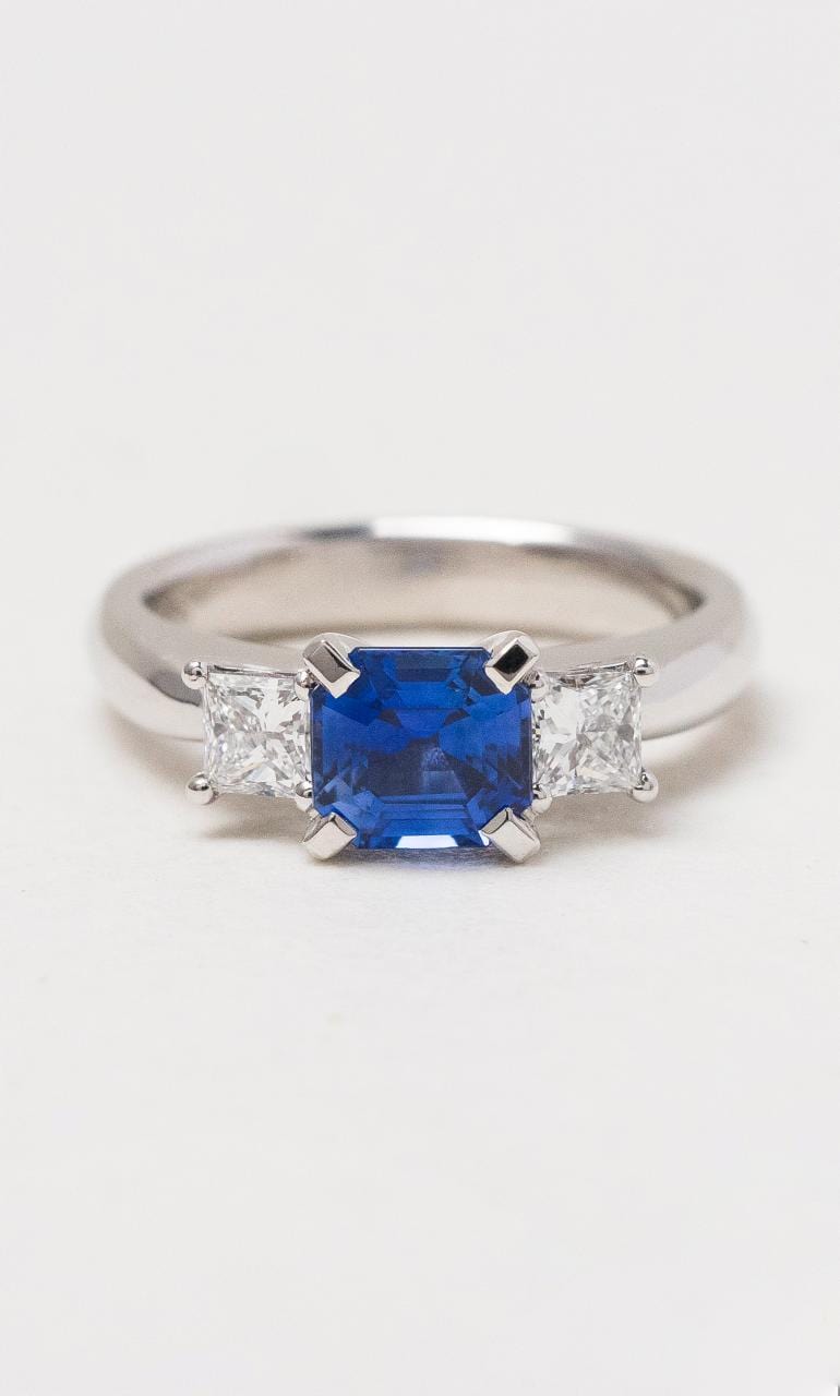 Hogans Family Jewellers 18K WG Emerald Cut Ceylon Sapphire Trilogy Ring