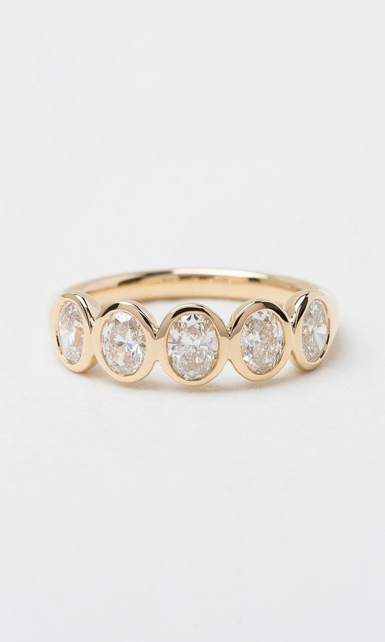 Hogans Family Jewellers 18K YG 1.19ct TDW Oval Cut Diamond Bezel Set Band