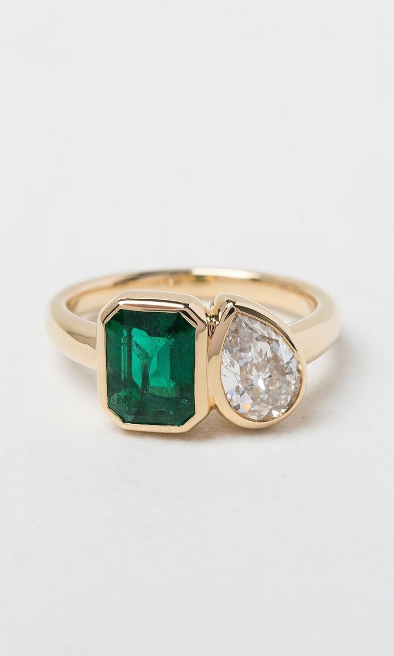 Hogans Family Jewellers 18K YG Emerald Cut Emerald Toi et Moi Dress Ring