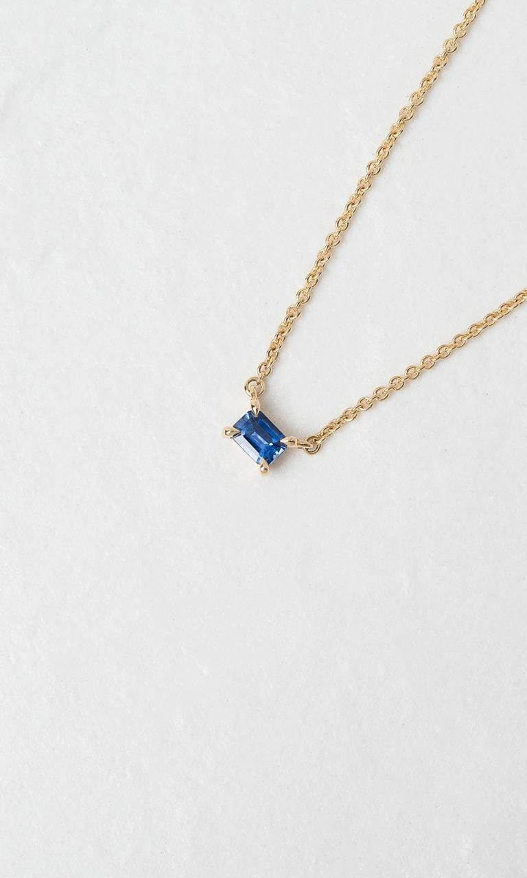 Hogans Family Jewellers 18K YG Emerald Cut Sapphire Solitaire Necklace