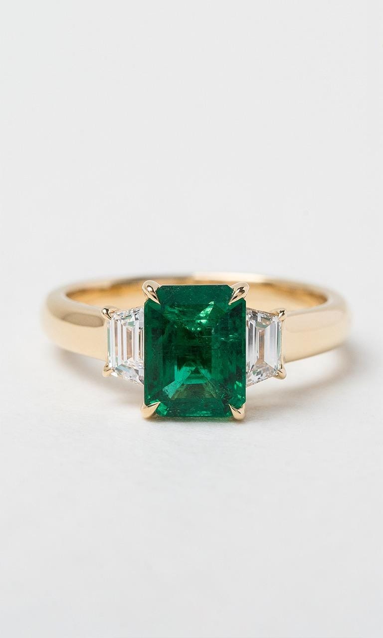 Hogans Family Jewellers 18K YG Emerald Cut Zambian Emerald Trilogy Dress Ring