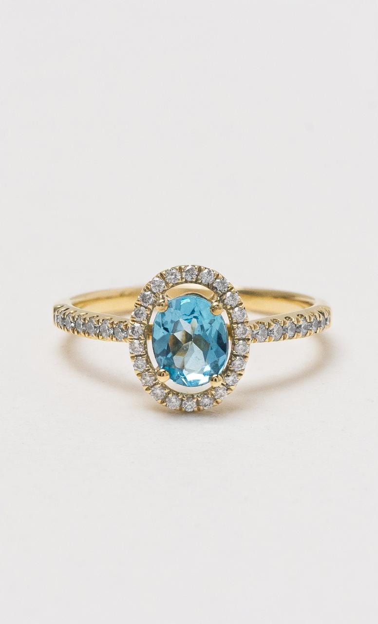 Hogans Family Jewellers 18K YG Oval Blue Topaz Ring