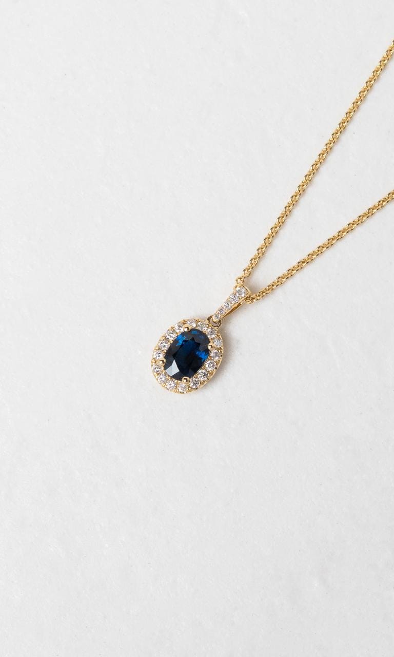 Hogans Family Jewellers 18K YG Oval Cut Sapphire Halo Pendant