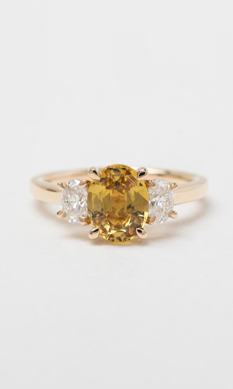 Hogans Family Jewellers 18K YG Oval Cut Sapphire Trilogy Ring