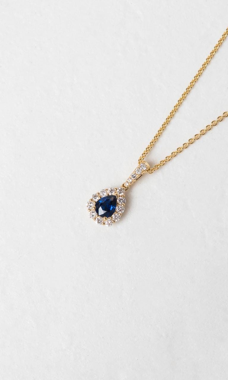 Hogans Family Jewellers 18K YG Pear Cut Sapphire Halo Pendant