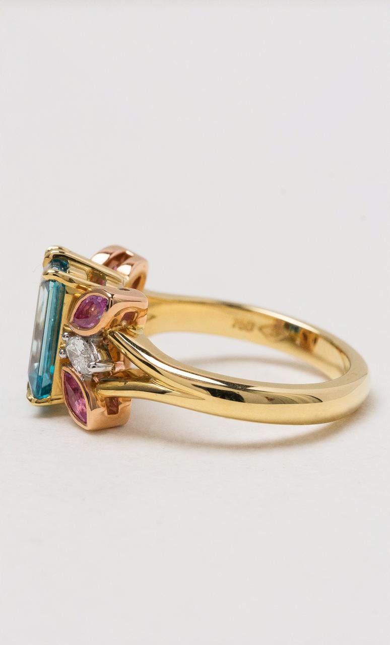 Hogans Family Jewellers 18K YRWG Emerald Cut Blue Zircon Dress Ring