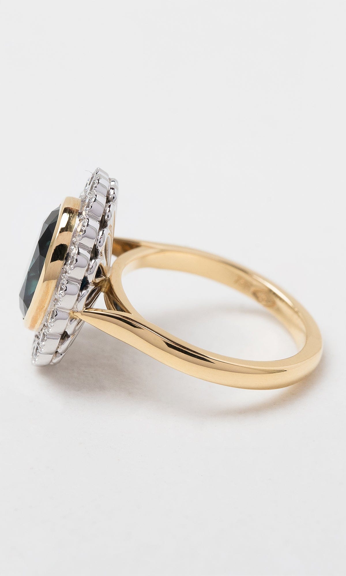 Hogans Family Jewellers 18K YWG Oval Cut Australian Sapphire Halo Ring