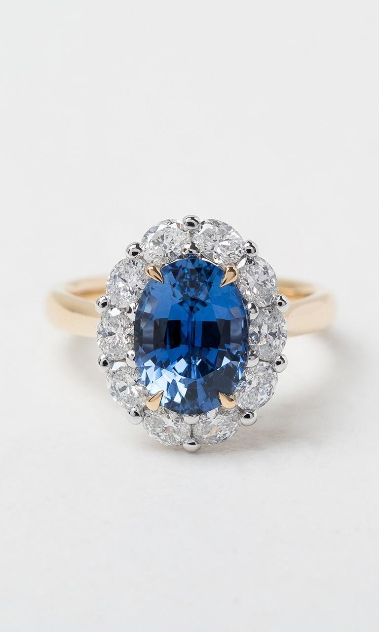 Hogans Family Jewellers 18K YWG Oval Cut Ceylon Sapphire Halo Ring