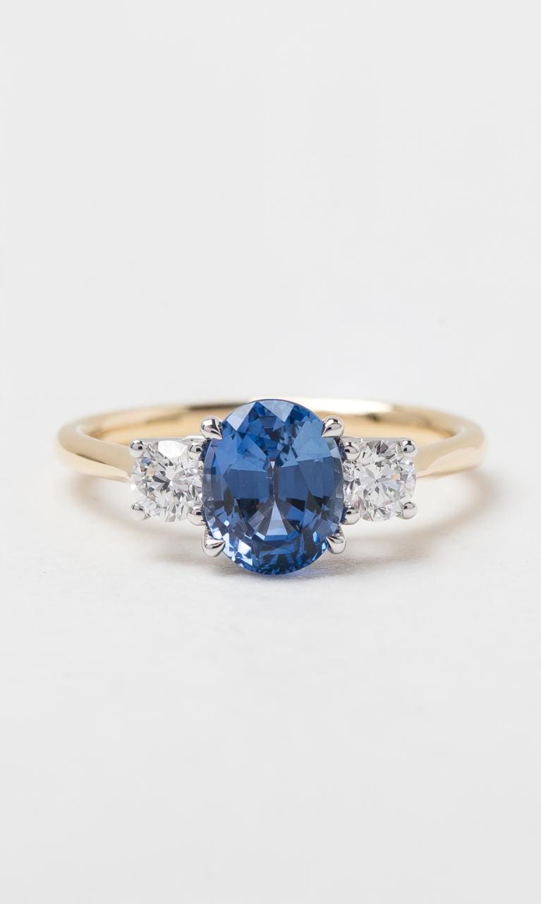 Hogans Family Jewellers 18K YWG Oval Cut Ceylon Sapphire Trilogy Ring