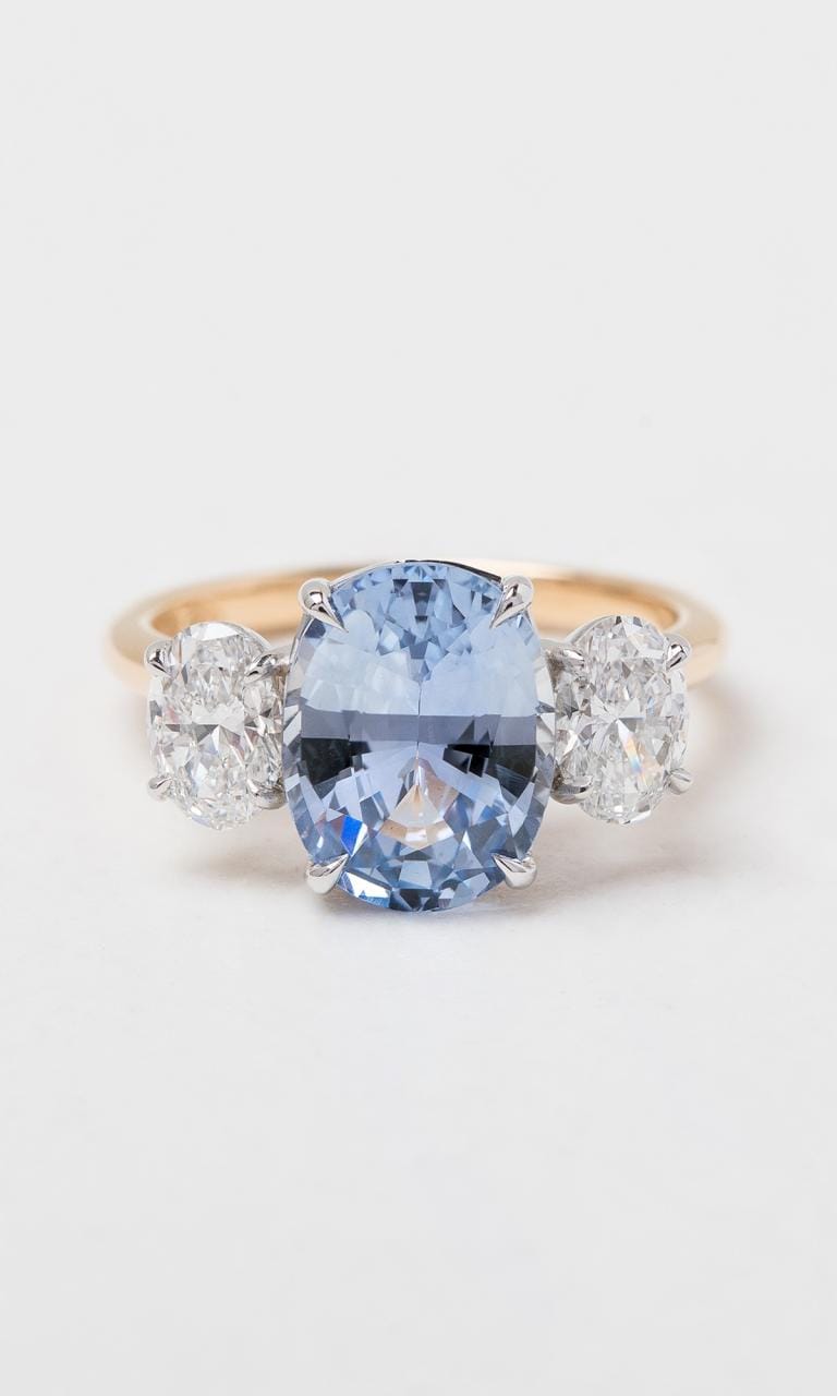 Hogans Family Jewellers 18K YWG Oval Cut Ceylon Sapphire Trilogy Ring