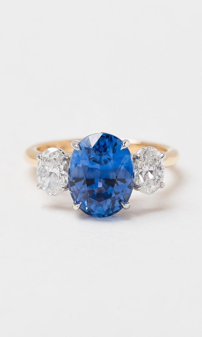Hogans Family Jewellers 18K YWG Oval Cut Ceylon Sapphire Trilogy Ring
