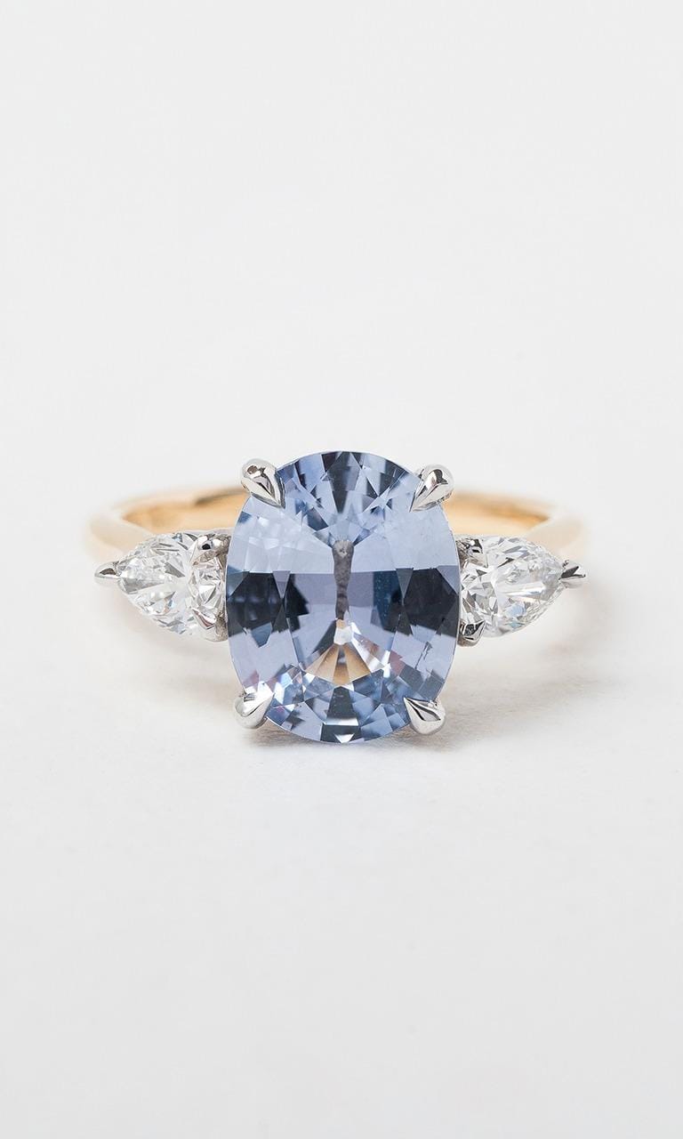 Hogans Family Jewellers 18K YWG Oval Cut Ceylon Sapphire Trilogy Ring