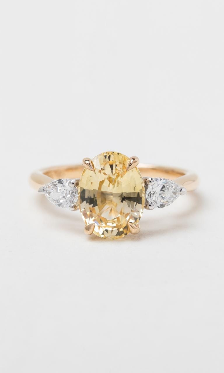 Hogans Family Jewellers 18K YWG Oval Cut Yellow Sapphire Trilogy Ring
