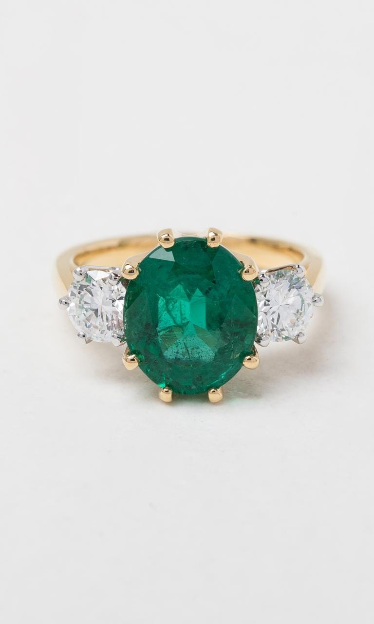 Hogans Family Jewellers 18K YWG Oval Cut Zambian Emerald Trilogy Dress Ring