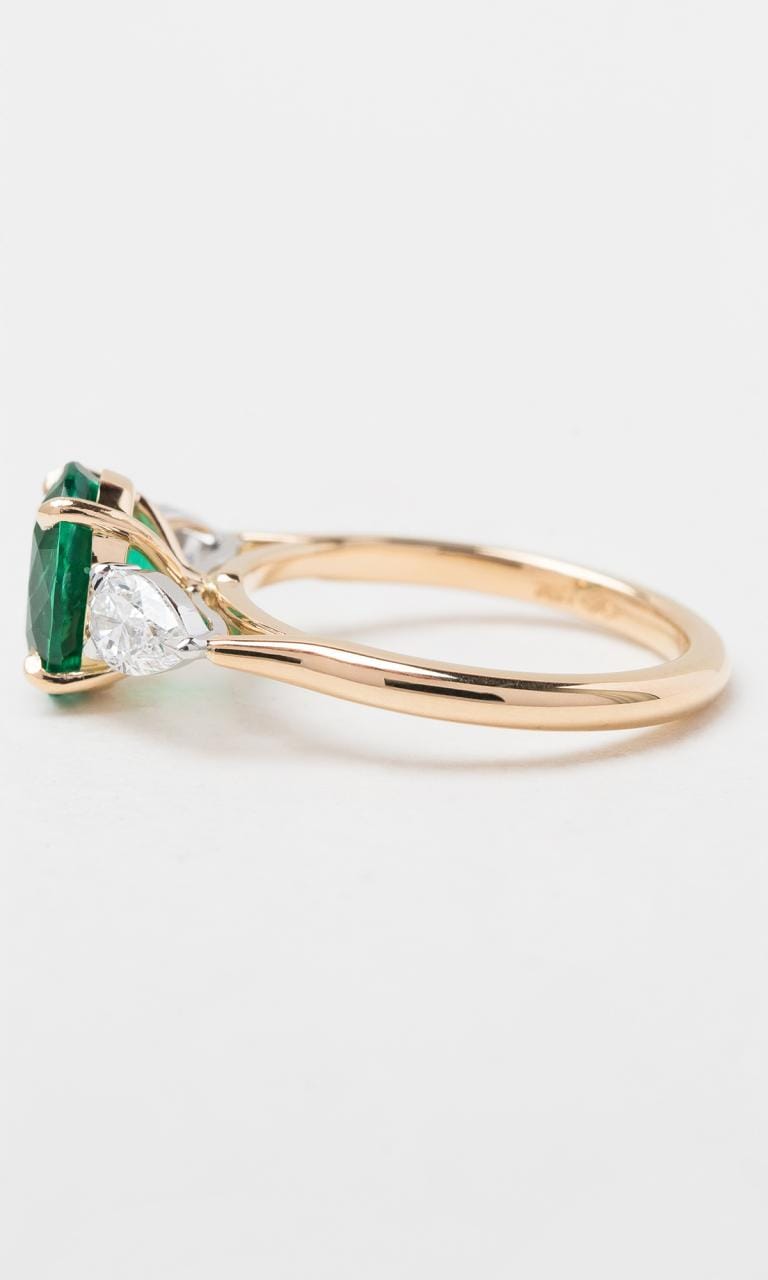 Hogans Family Jewellers 18K YWG Oval Cut Zambian Emerald Trilogy Dress Ring