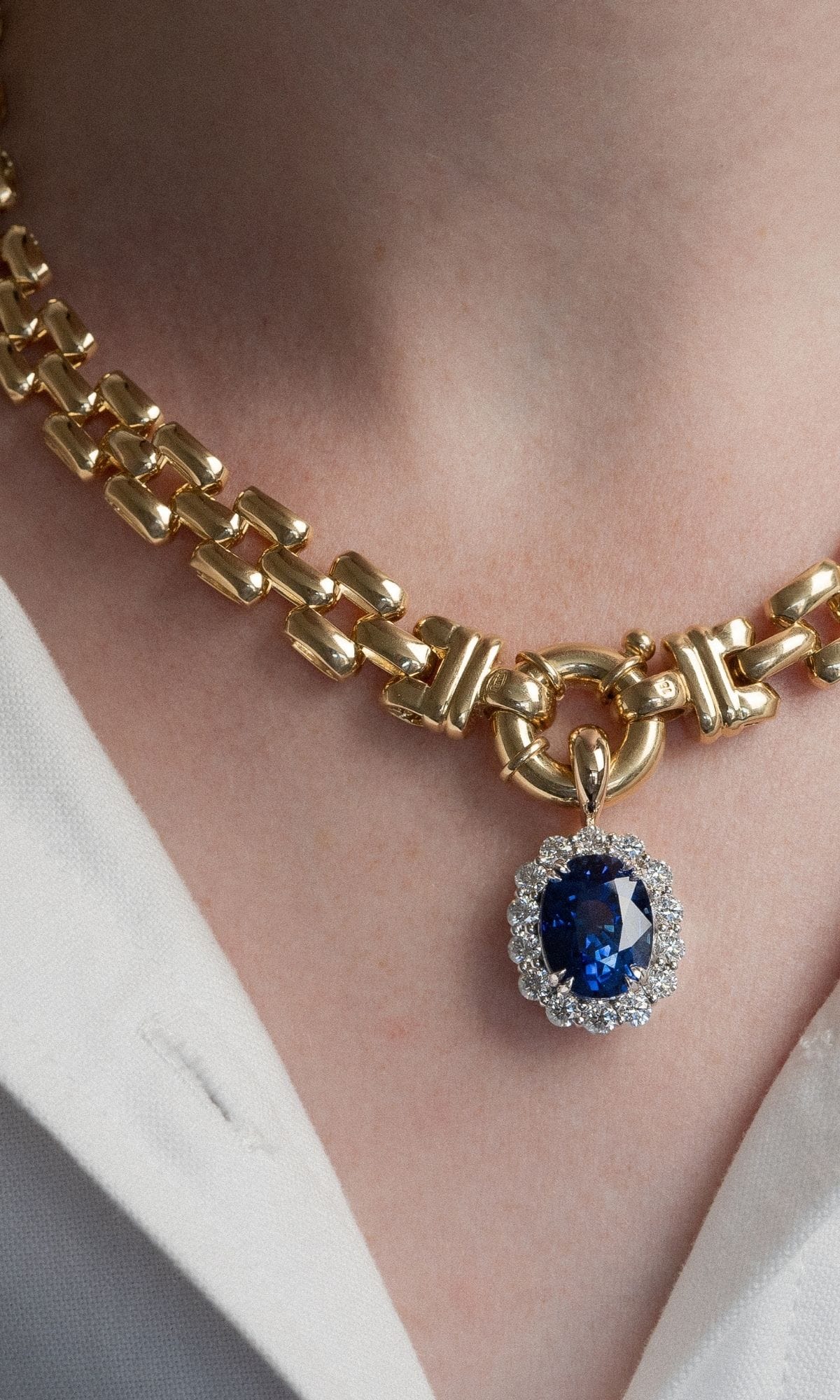 Hogans Family Jewellers 18K YWG Sapphire & Diamond Halo Pendant