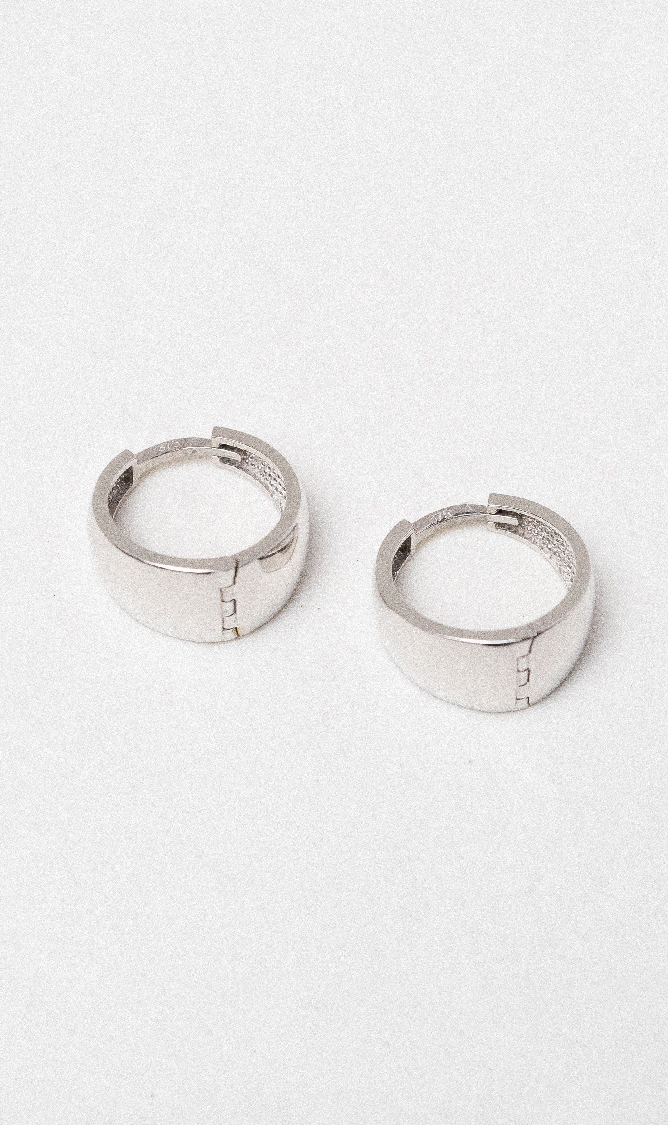 Hogans Family Jewellers 9K WG Graduated Plain Huggie Earrings