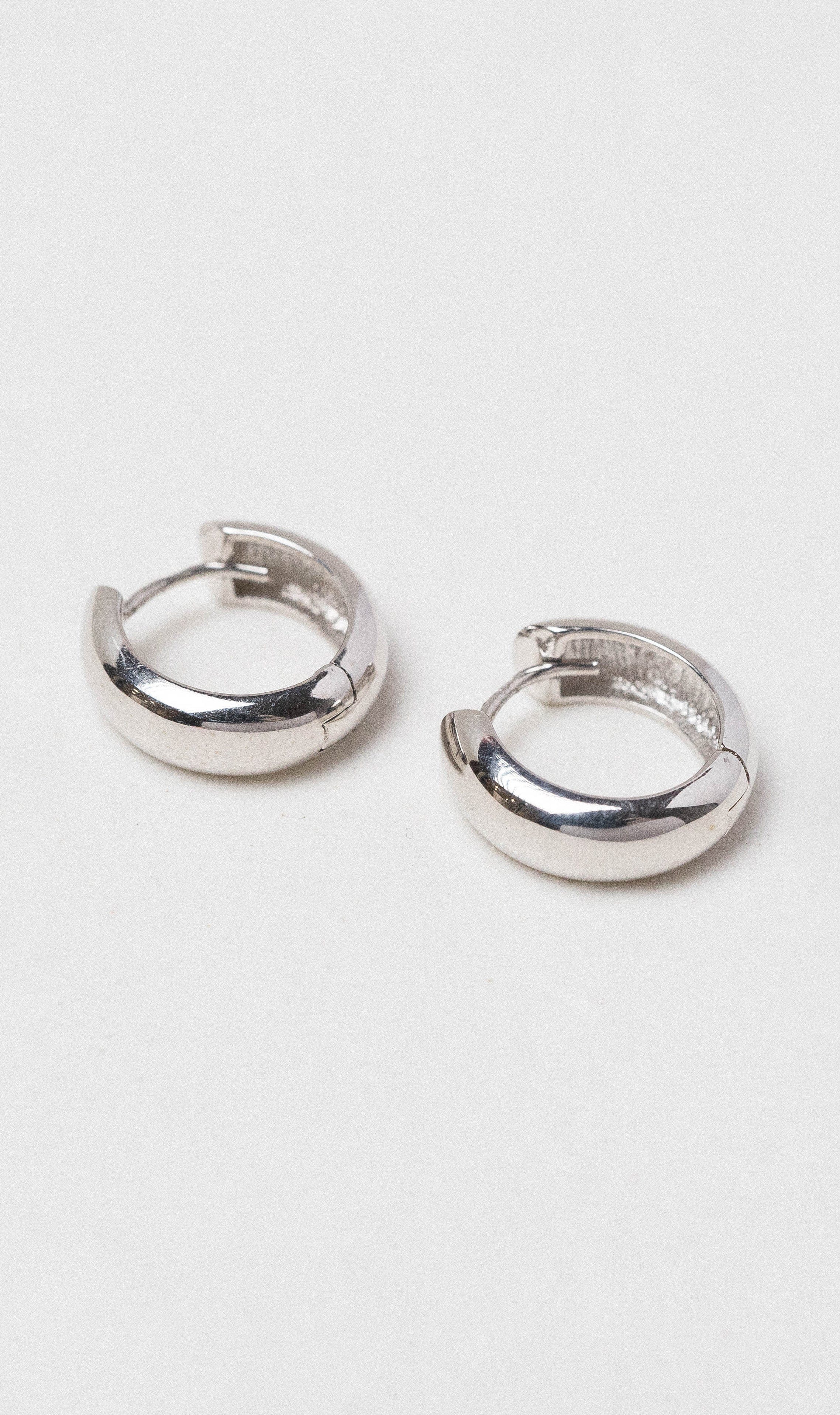 Hogans Family Jewellers 9K WG Half Round Huggie Earrings