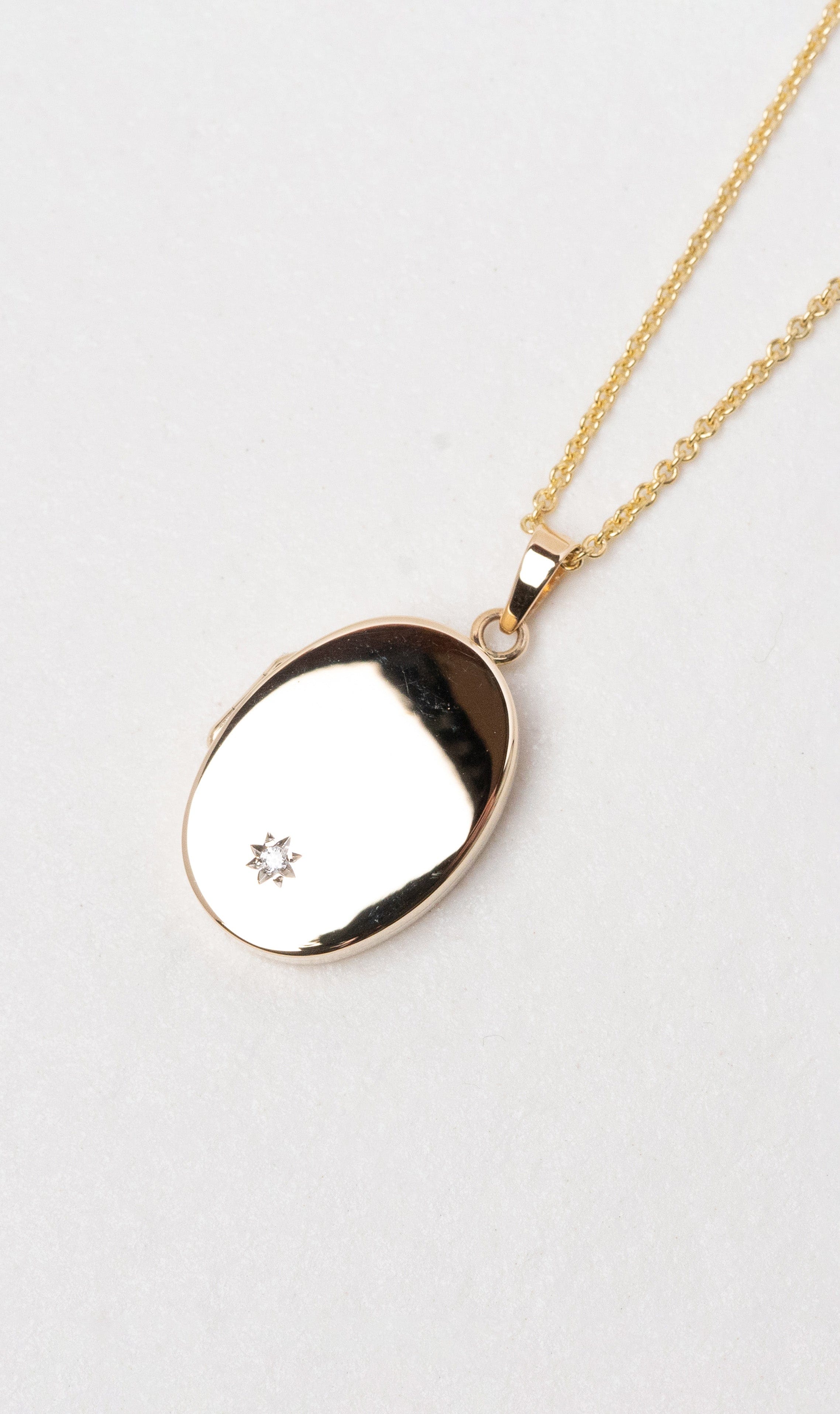 Hogans Family Jewellers 9K YG Diamond Set Oval Locket