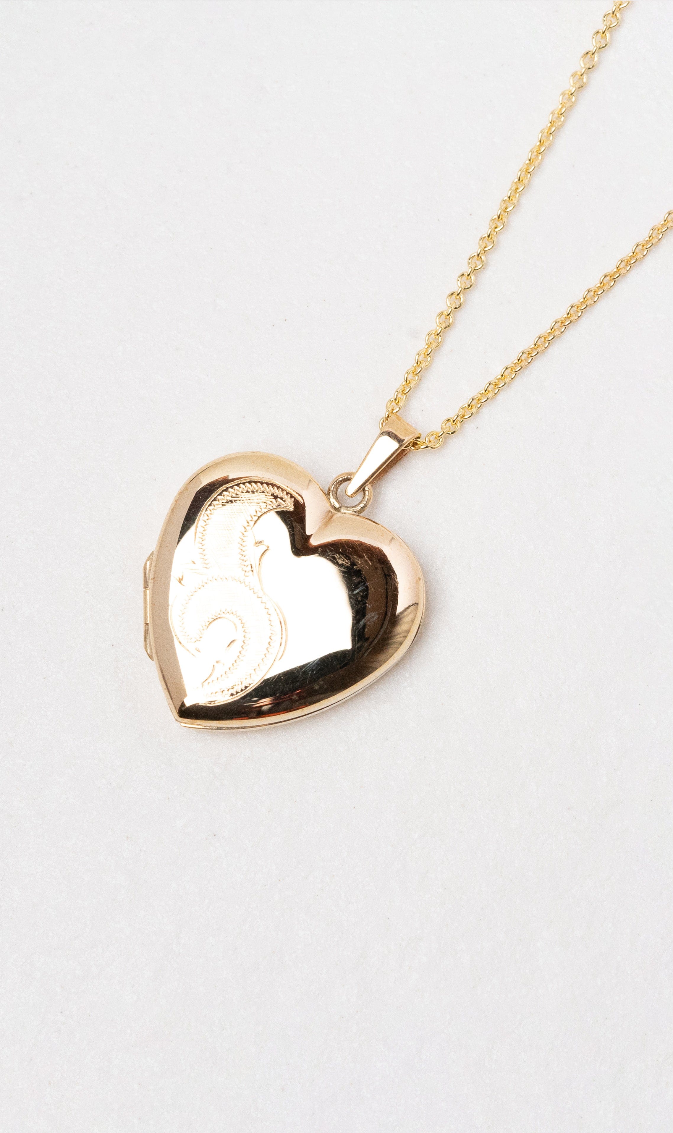 Hogans Family Jewellers 9K YG Heart Pattern Locket