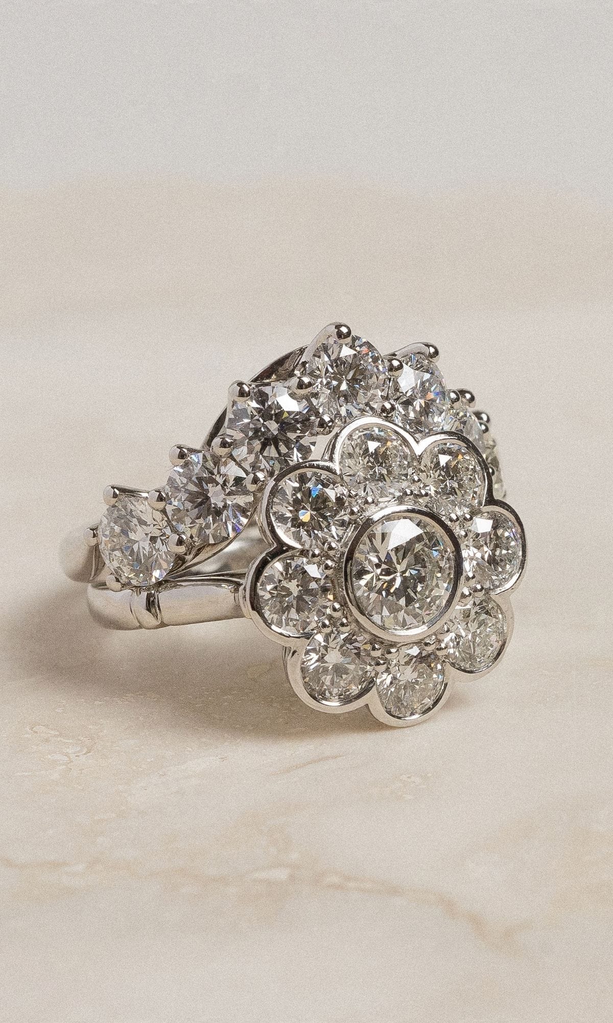 Hogans Family Jewellers Bespoke 18K WG Diamond Floral Halo Ring & Contoured Band