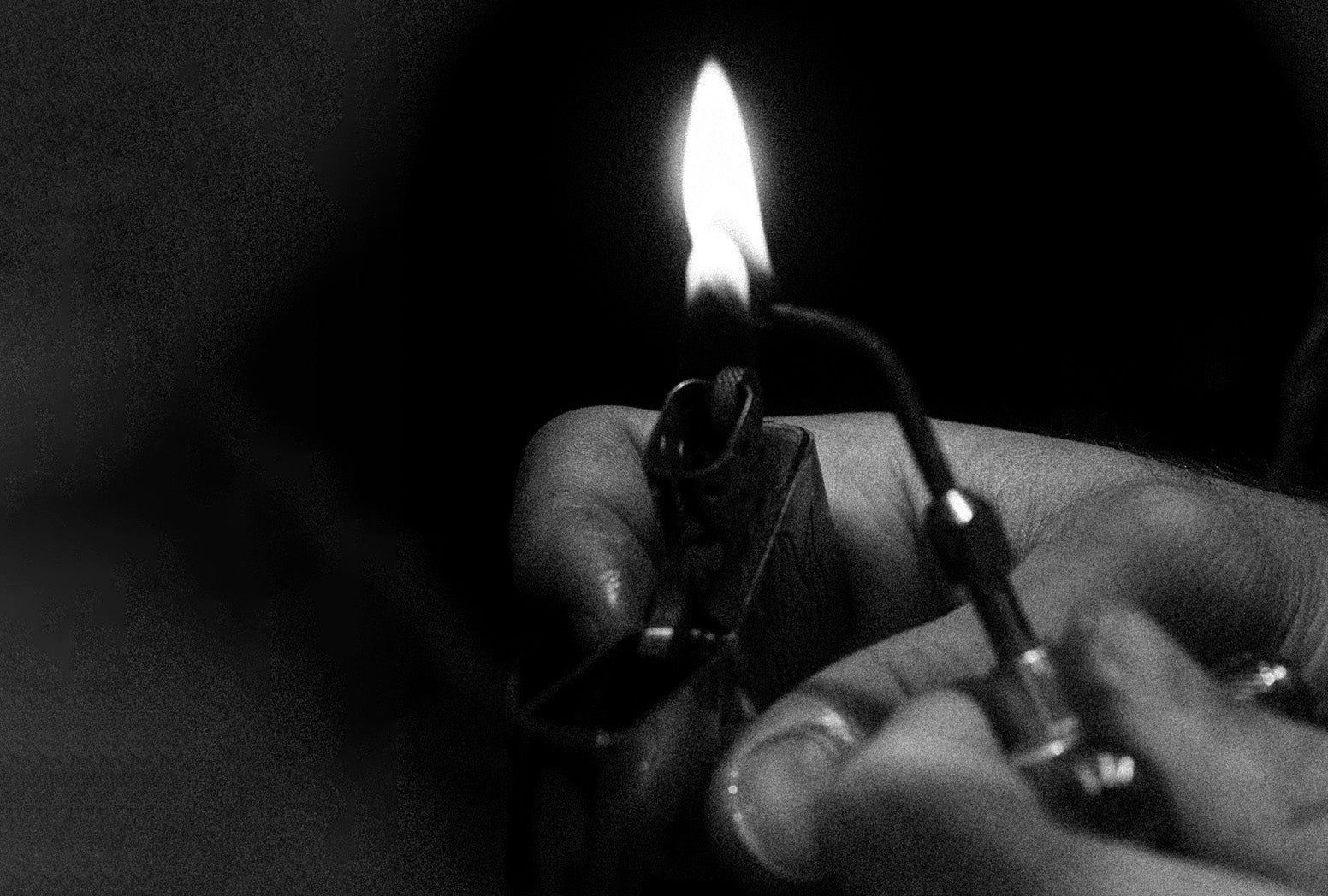 Jeweller lighting flame.