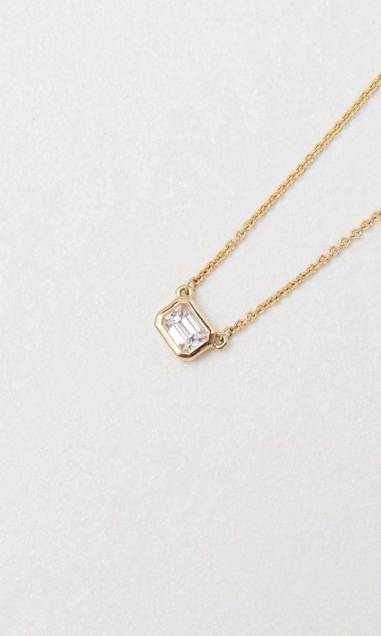 2024 © Hogans Family Jewellers 18K YG Bezel Set Emerald Cut Diamond Necklace