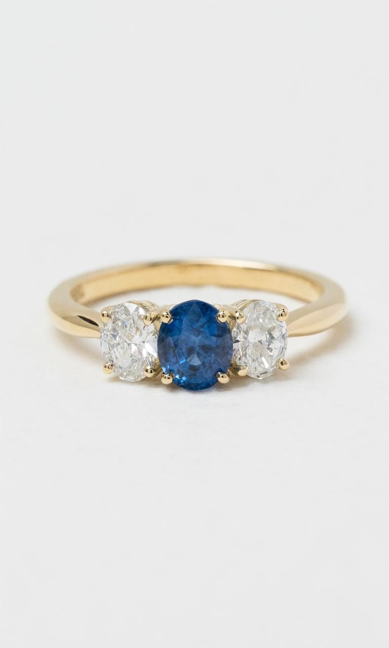 2024 © Hogans Family Jewellers 18K YG Oval Ceylon Sapphire & Diamond Trilogy Ring