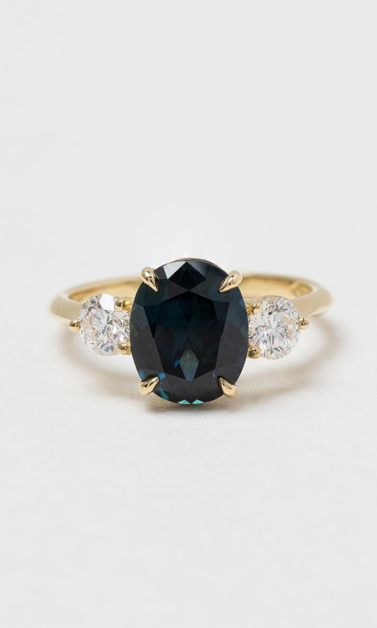 2024 © Hogans Family Jewellers 18K YG Oval Sapphire Trilogy Ring