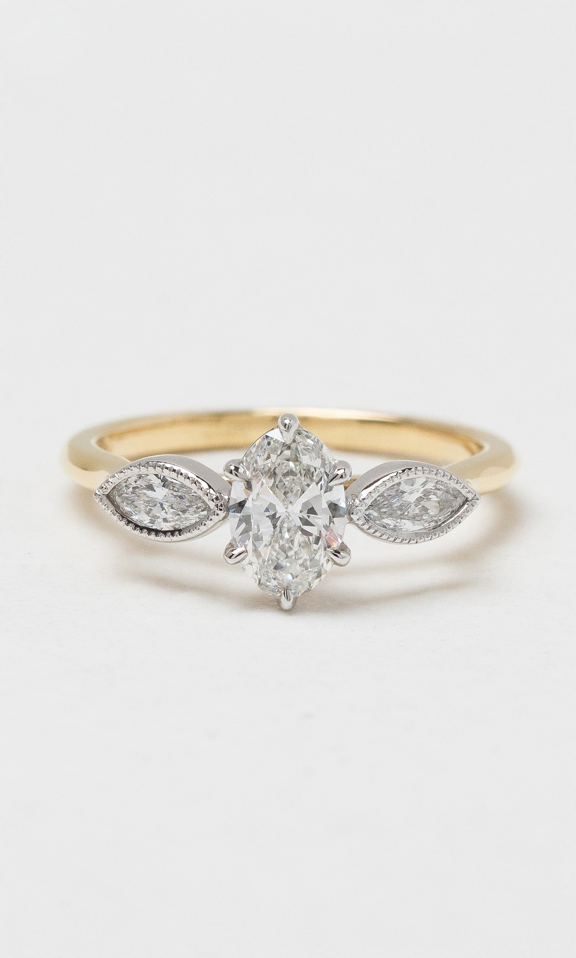 2024 © Hogans Family Jewellers 18K YWG Oval Cut Diamond Trilogy Ring