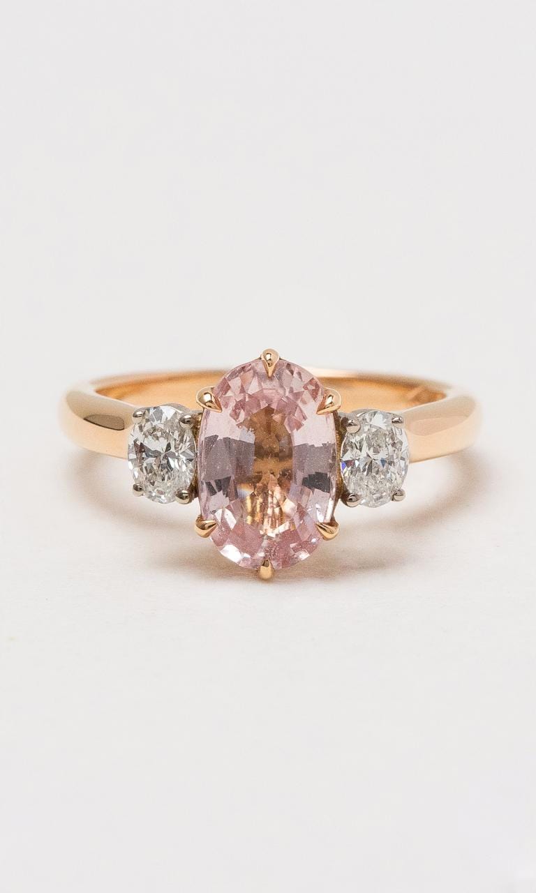 18K RWG Oval Cut Peach Sapphire Trilogy Ring Hogans Family Jewellers