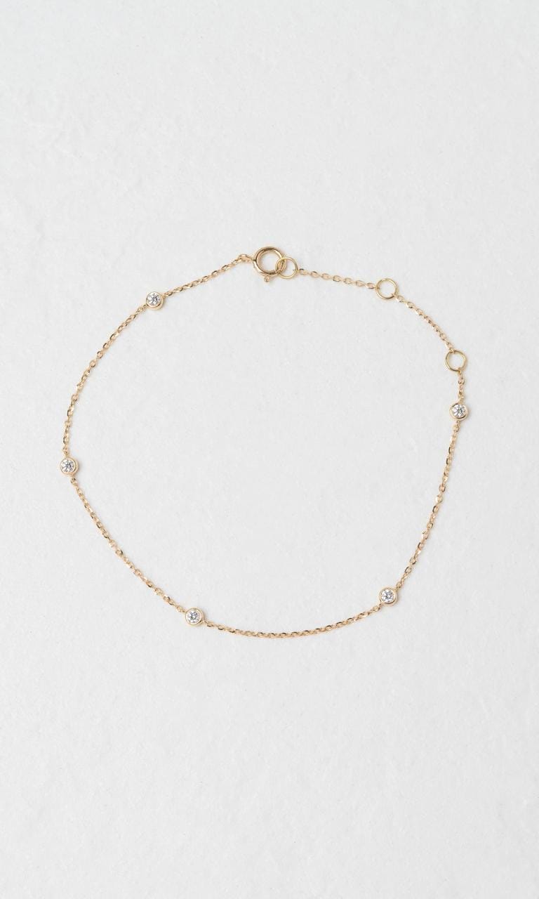 Hogans Family Jewellers 18K YG 0.147ct TDW Round Brilliant Cut Diamond Bezel Set Bracelet
