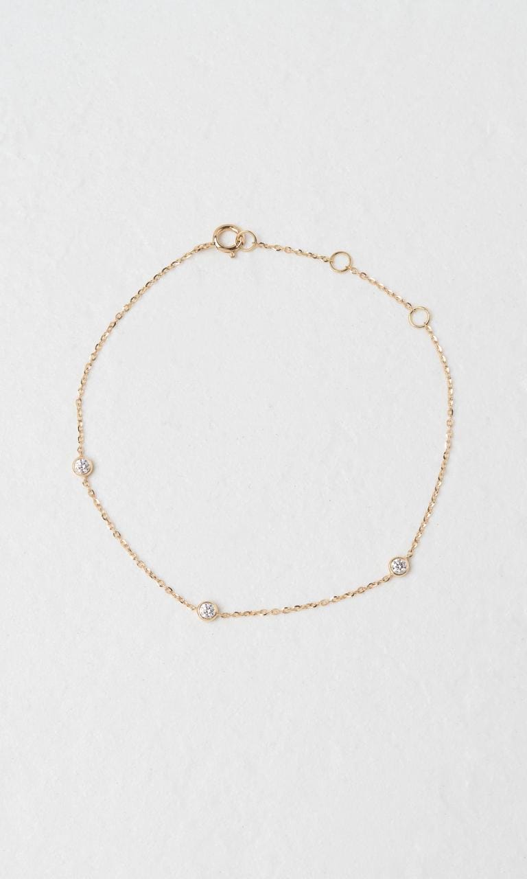 Hogans Family Jewellers 18K YG 0.14ct TDW Round Brilliant Cut Diamond Bezel Set Bracelet