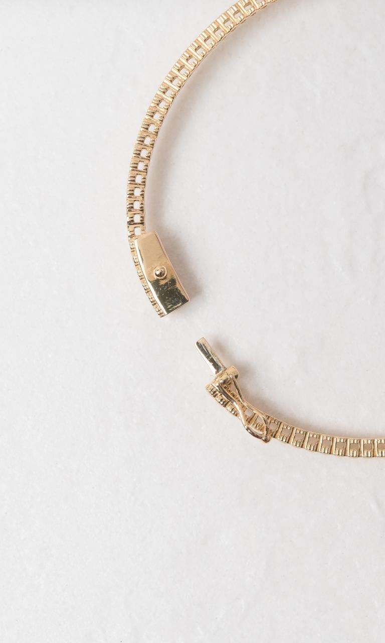 Hogans Family Jewellers 18K YG 0.34ct TDW Round Brilliant Cut Diamond Bangle