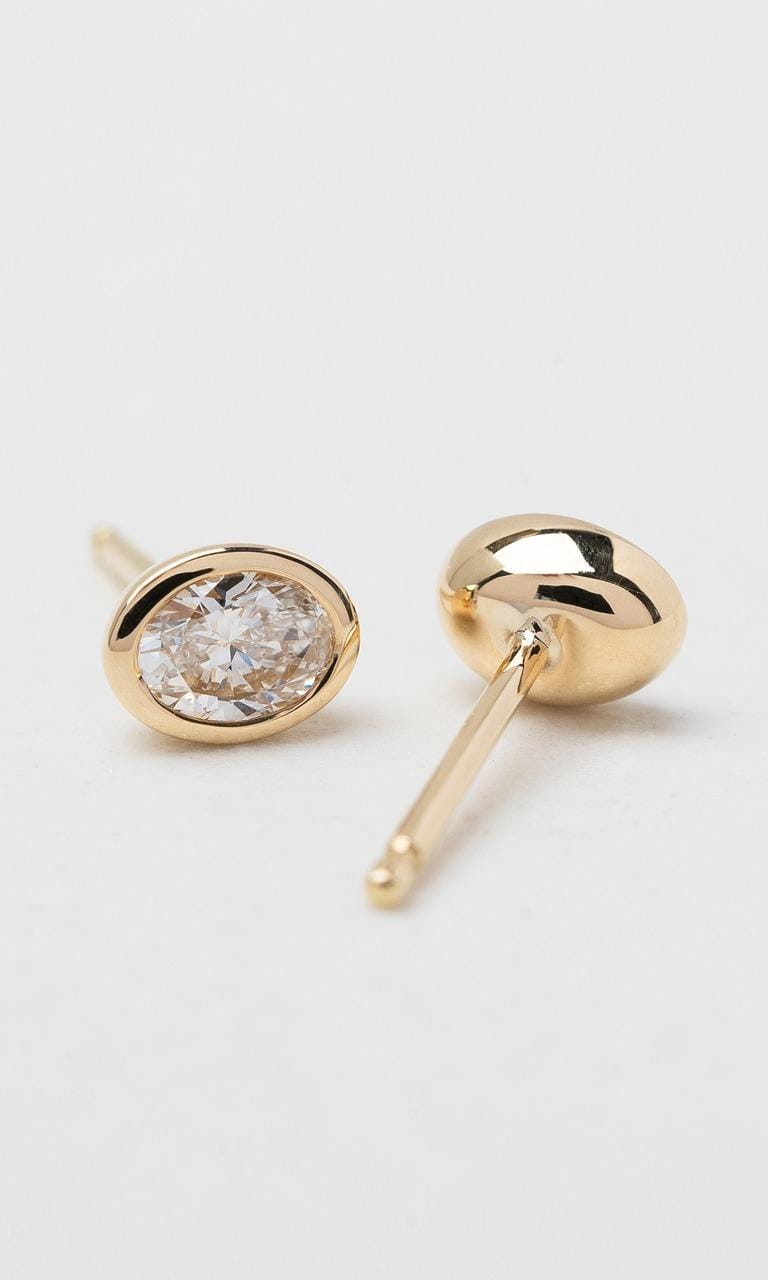Hogans Family Jewellers 18K YG 0.36ct TDW Oval Cut Diamond Bezel Set Stud Earrings