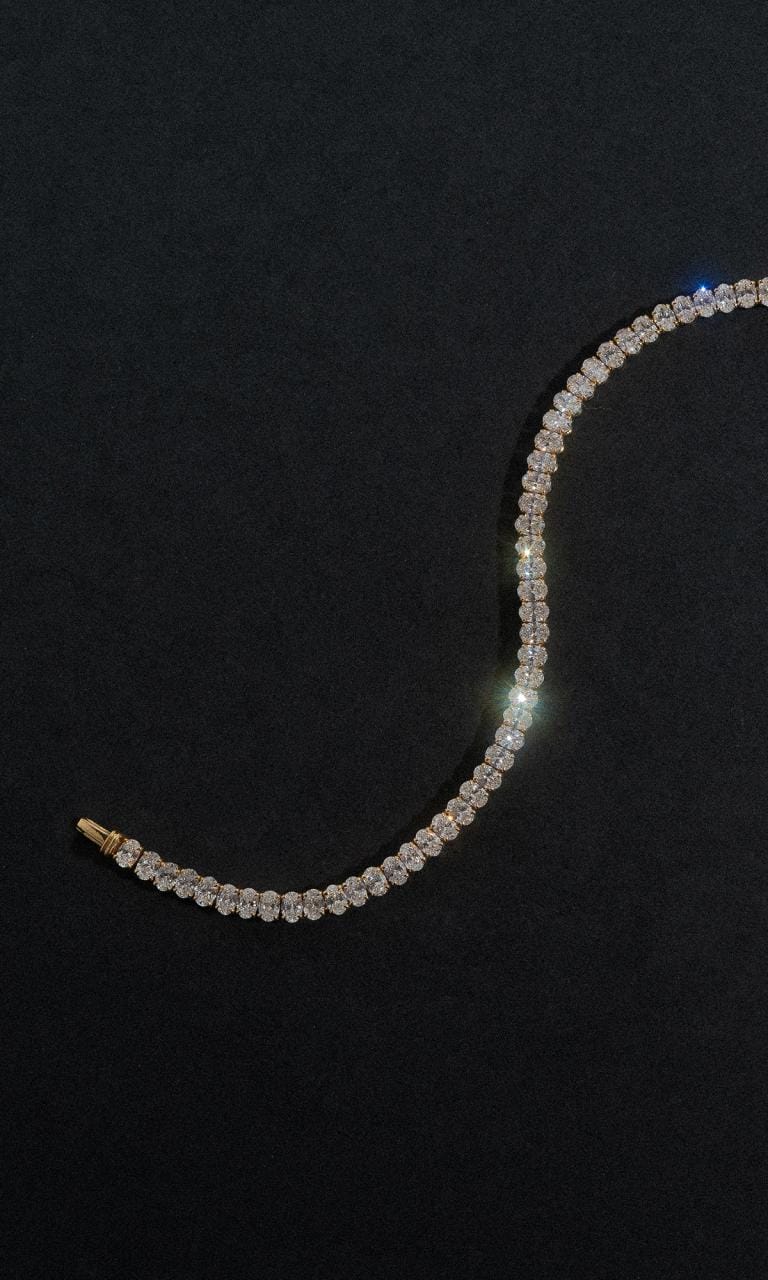 Hogans Family Jewellers 18K YG 7.08ct TDW Oval Cut Diamond Tennis Bracelet