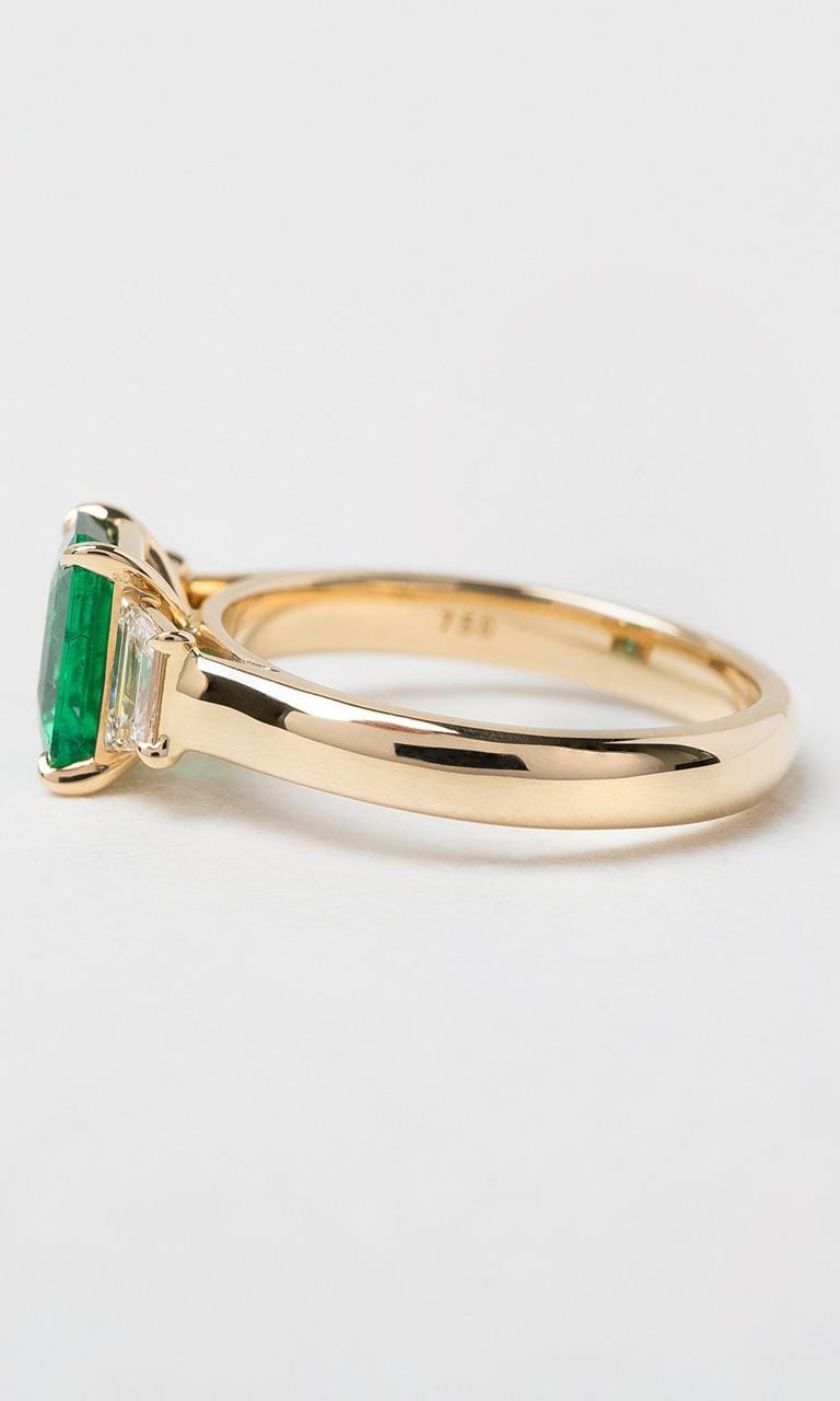 Hogans Family Jewellers 18K YG Emerald Cut Zambian Emerald Trilogy Dress Ring
