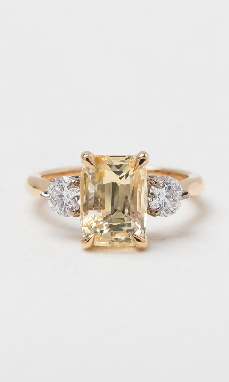 Hogans Family Jewellers 18K YWG Cushion Cut Sapphire Trilogy Ring