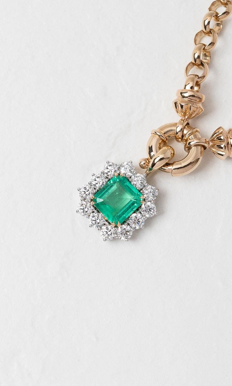 Hogans Family Jewellers 18K YWG Emerald Cut Emerald Halo Pendant