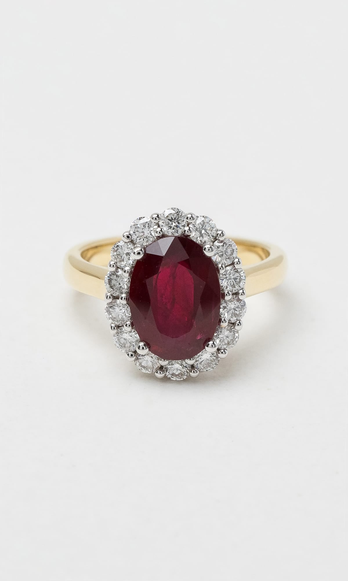 Hogans Family Jewellers 18K YWG Mozambique Ruby & Diamond Halo Ring