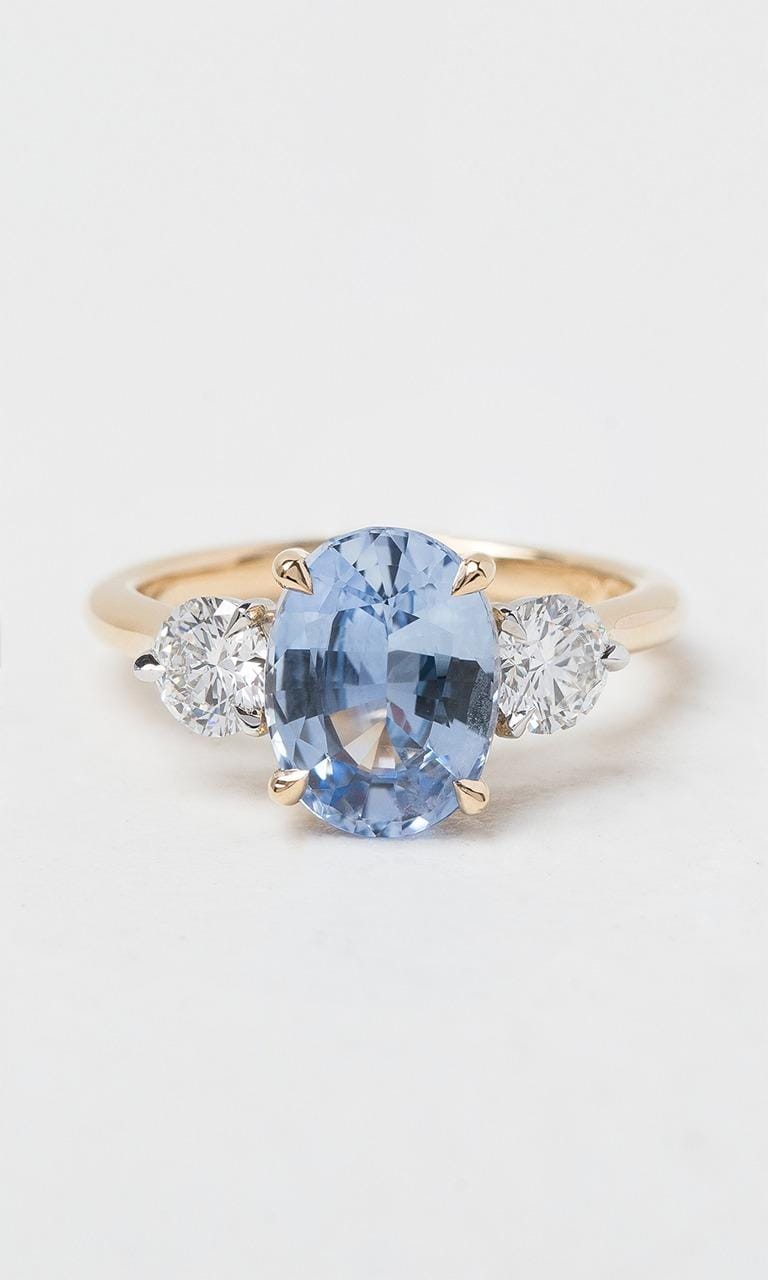 Hogans Family Jewellers 18K YWG Oval Cut Ceylon Sapphire Trilogy Ring