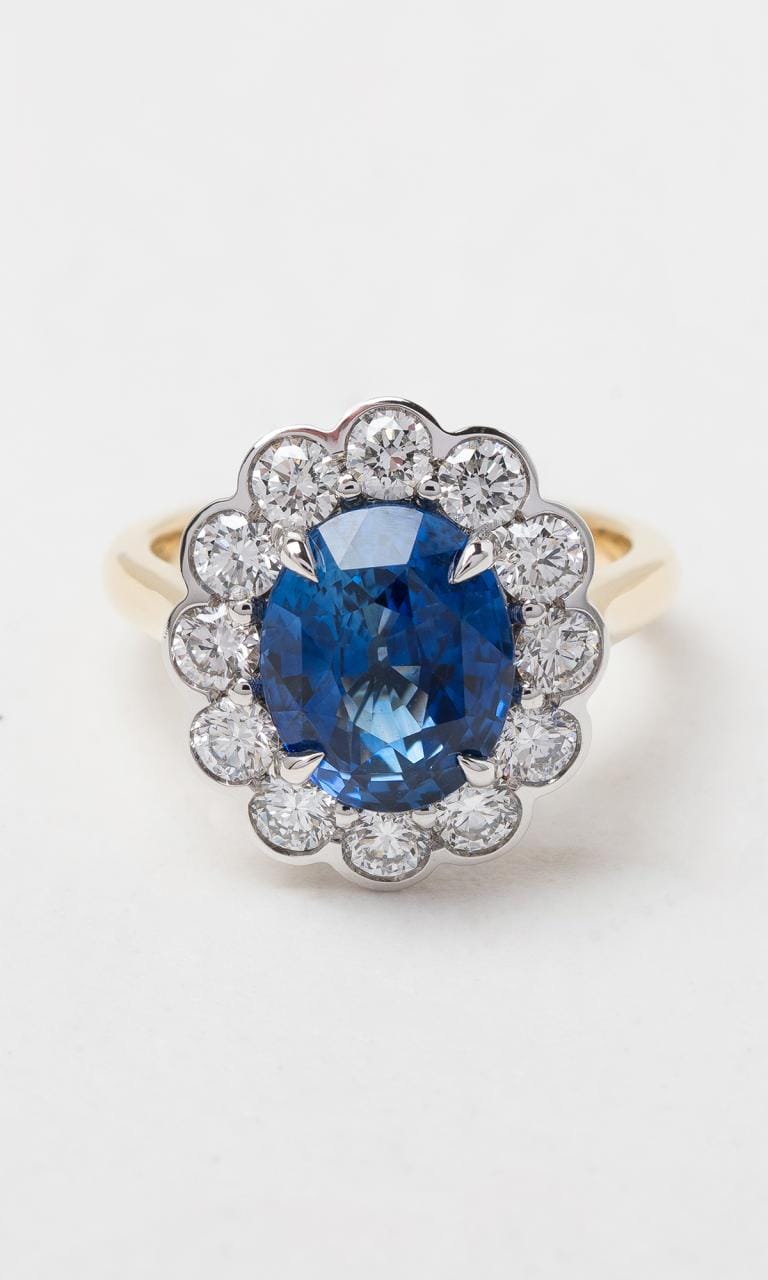 Hogans Family Jewellers 18K YWG Oval Cut Sapphire Halo Ring