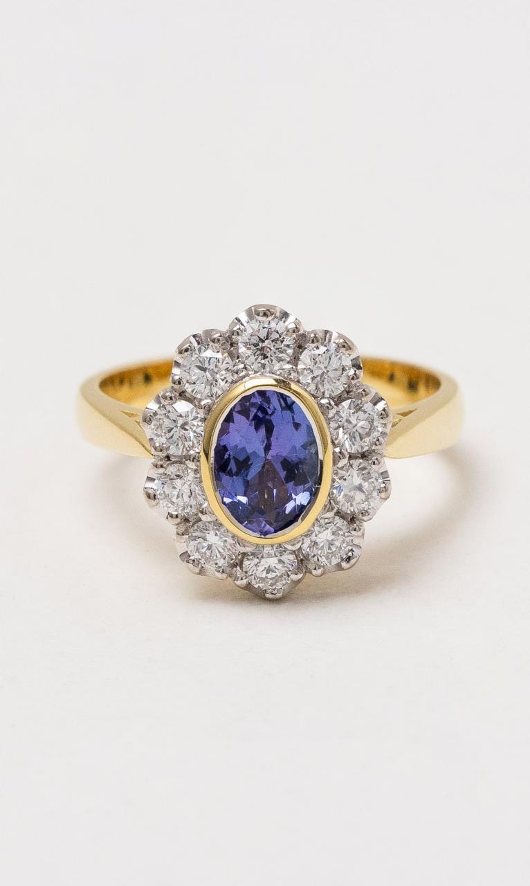 Hogans Family Jewellers 18K YWG Oval Cut Tanzanite Halo Style Ring