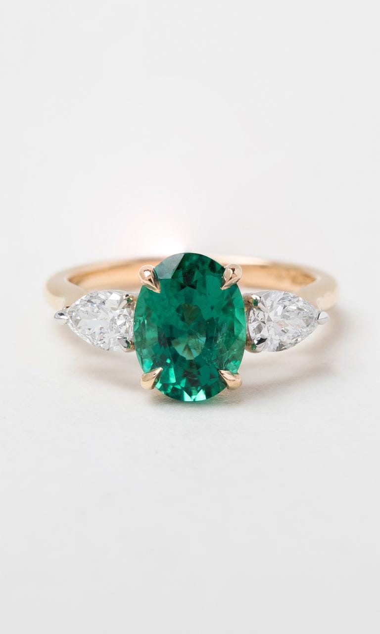 Hogans Family Jewellers 18K YWG Oval Cut Zambian Emerald Trilogy Dress Ring